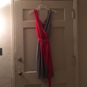 A dress it’s grey and orange with belt